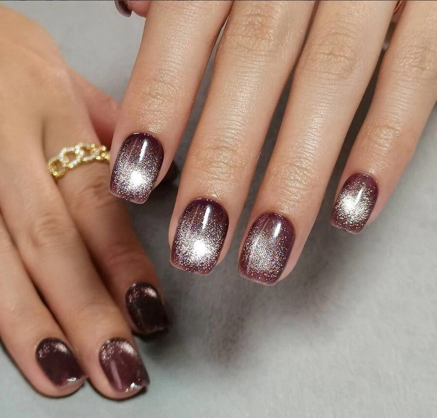 Ice blue aura cat eye nails