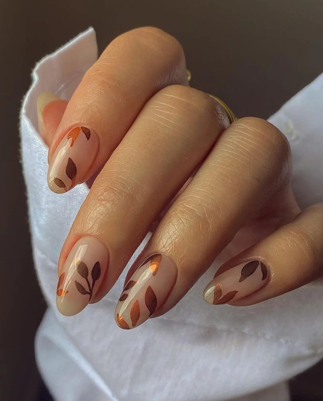 Rust colored chrome almond nails