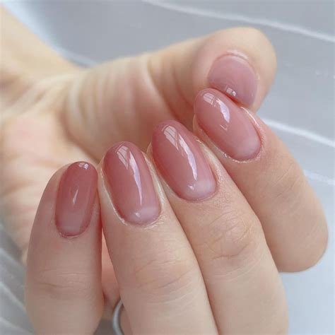 Sheer plum jelly polish nails with translucent finish