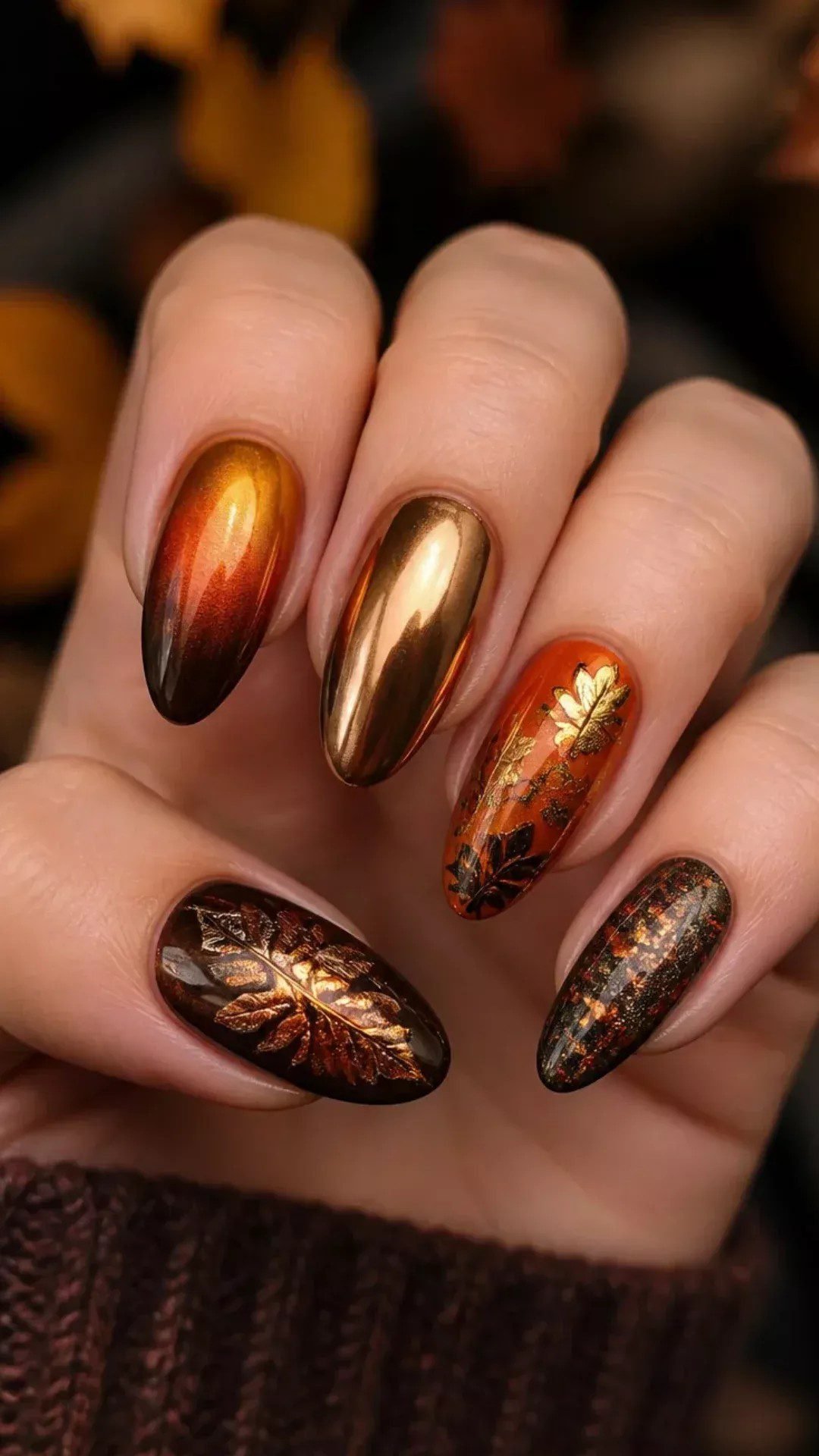 Oxblood red nails with gold foil border