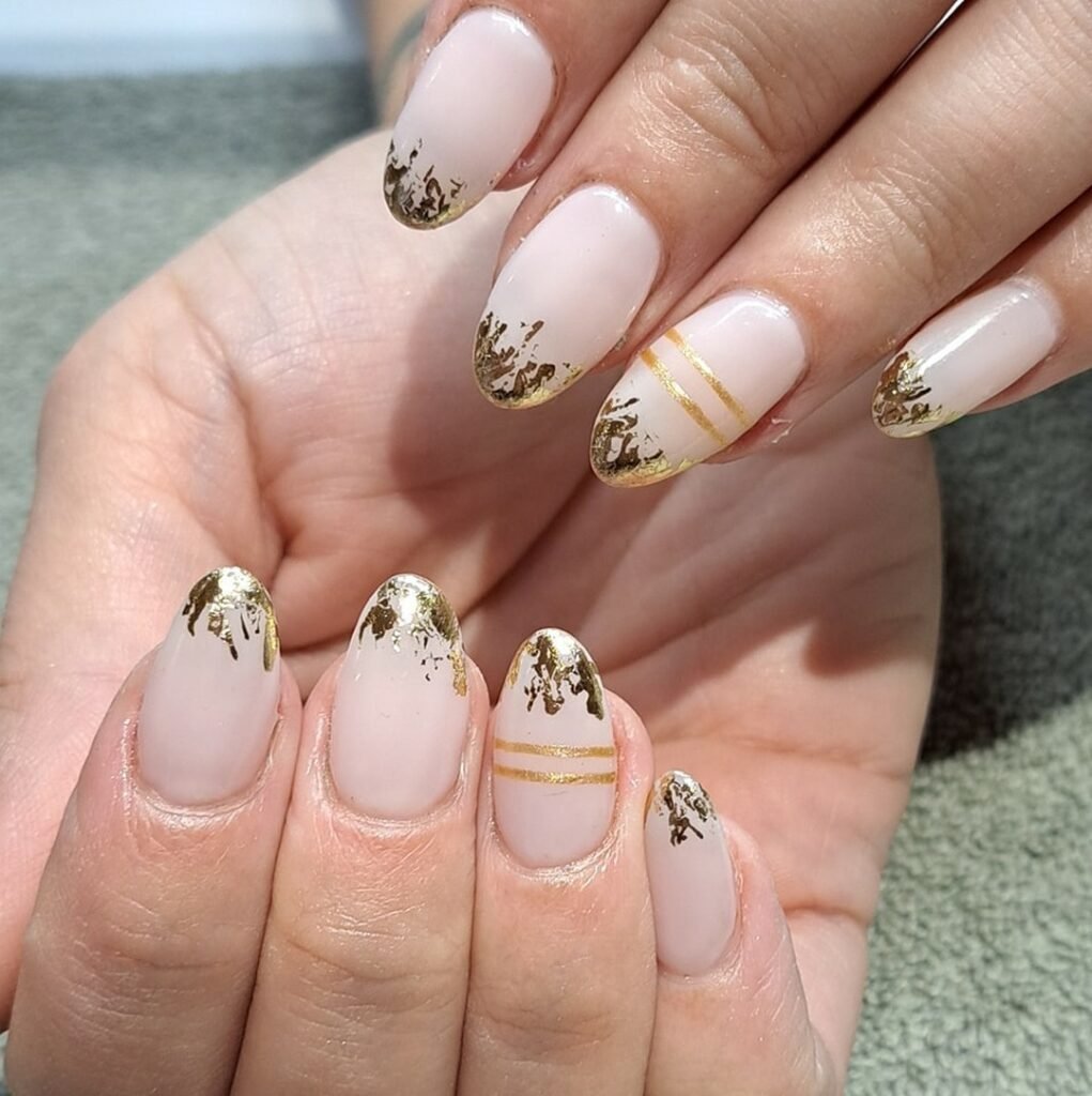Terracotta nails with gold foil swirls
