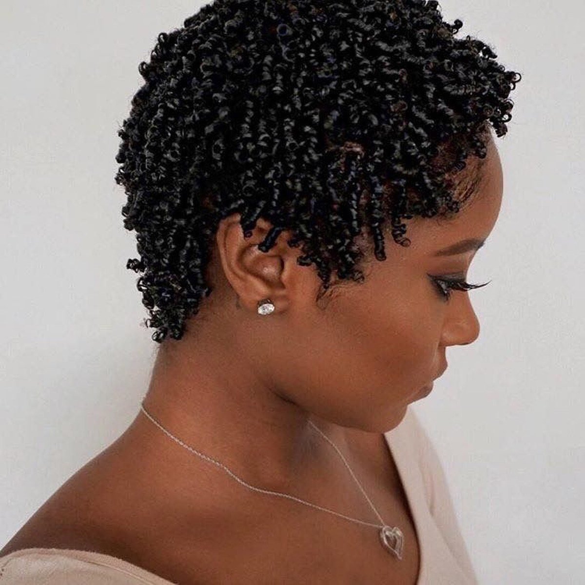 Short finger coils on natural hair