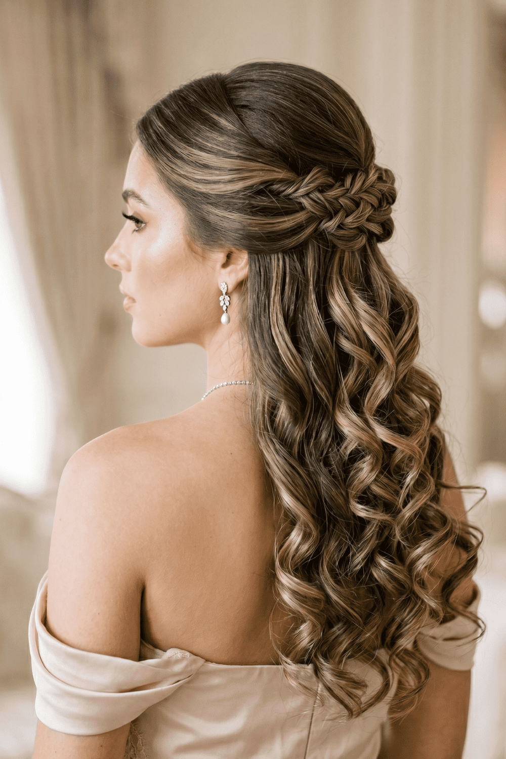 Sleek Top Half, Voluminous Curled Bottom