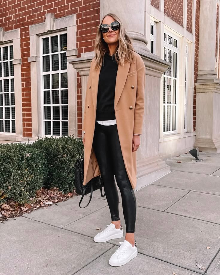 Quilted jacket with a team tee and mom jeans for a tailgate