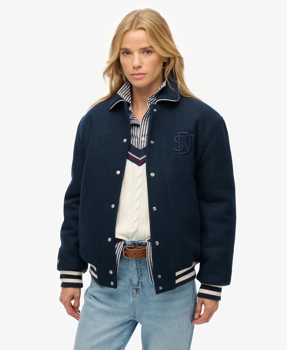 Plaid shacket over a graphic team tee for a tailgate outfit