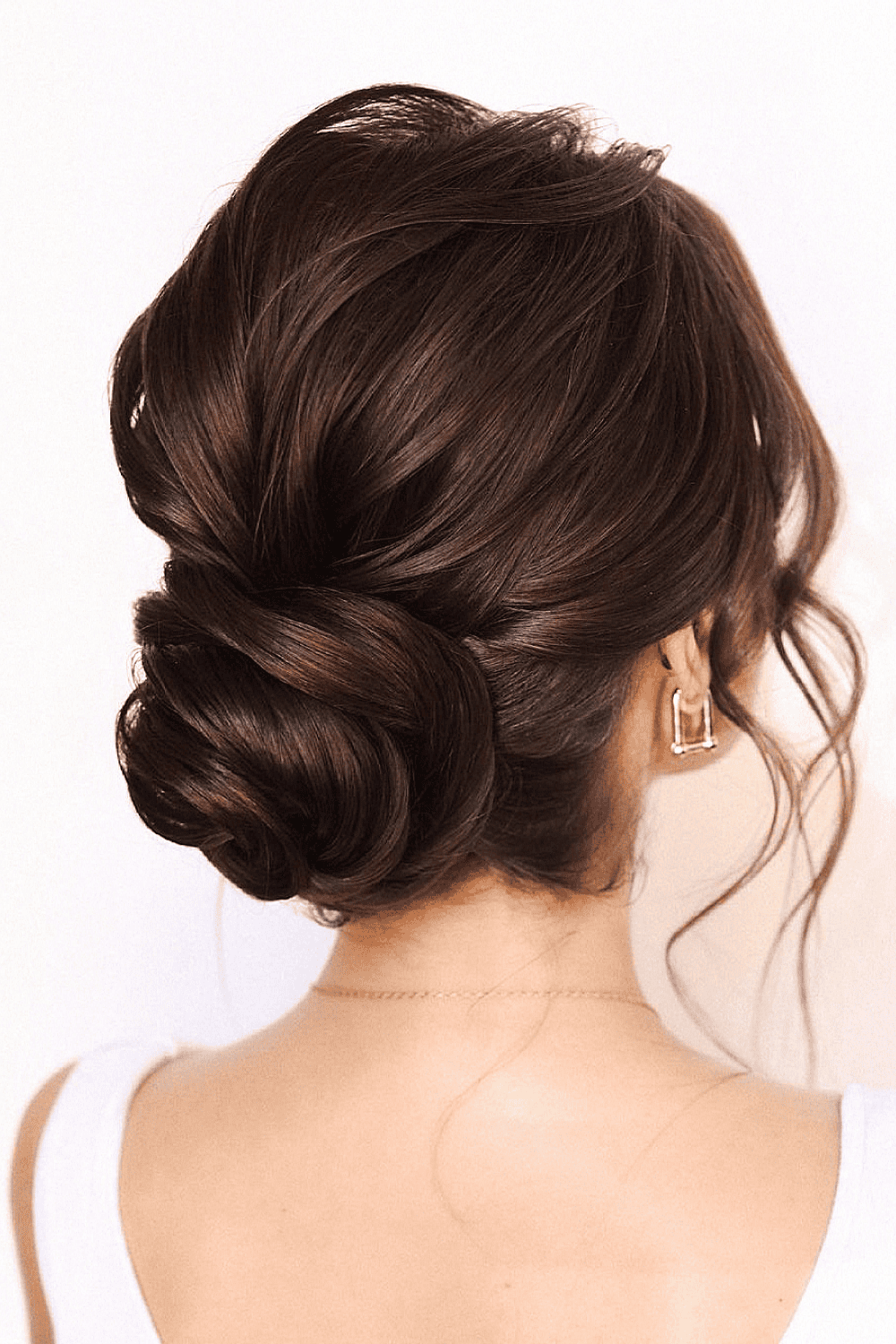 8. Low Twisted Chignon with Volume