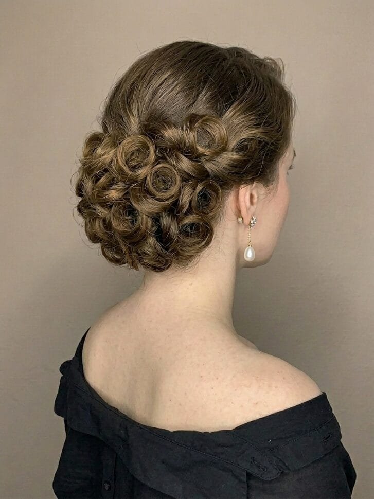 13. Voluminous Pinned Curls Updo