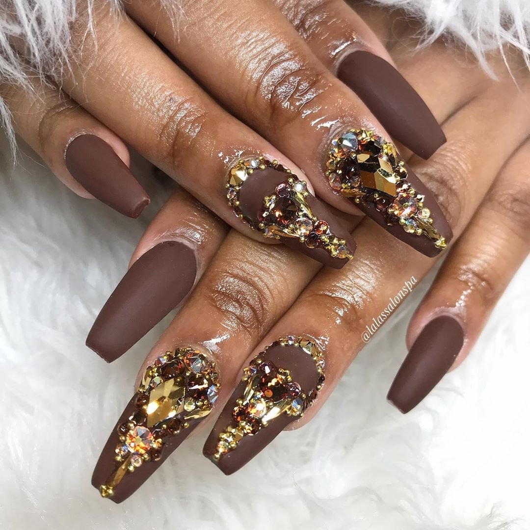 Dark chocolate coffin nails with gold gem embellishments