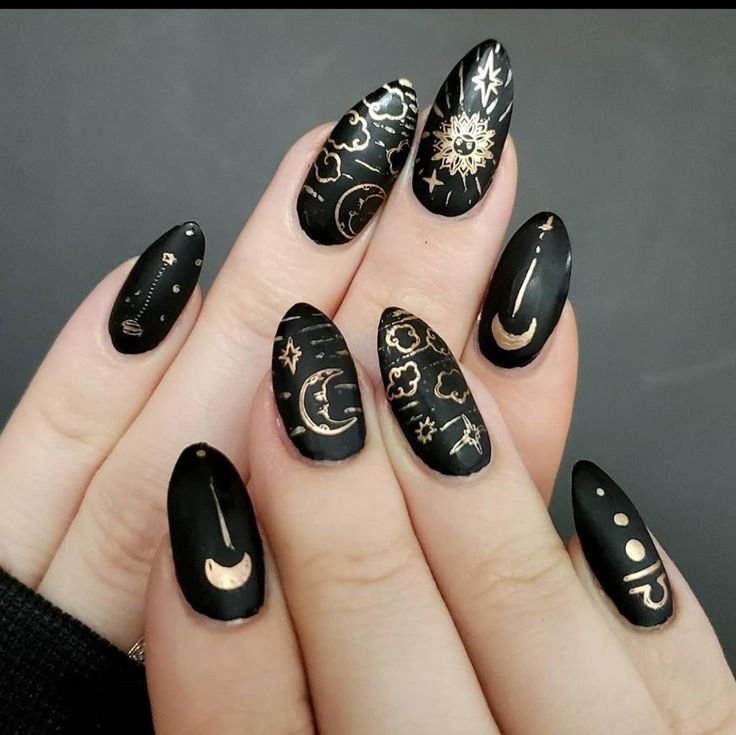 Midnight black nails with gold crescent moon nail art