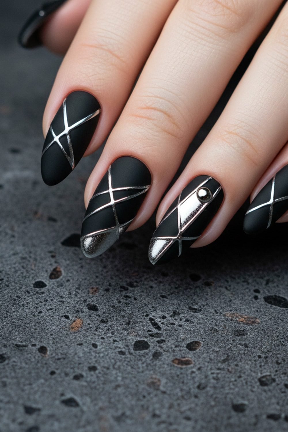Black nails with silver geometric celestial line art