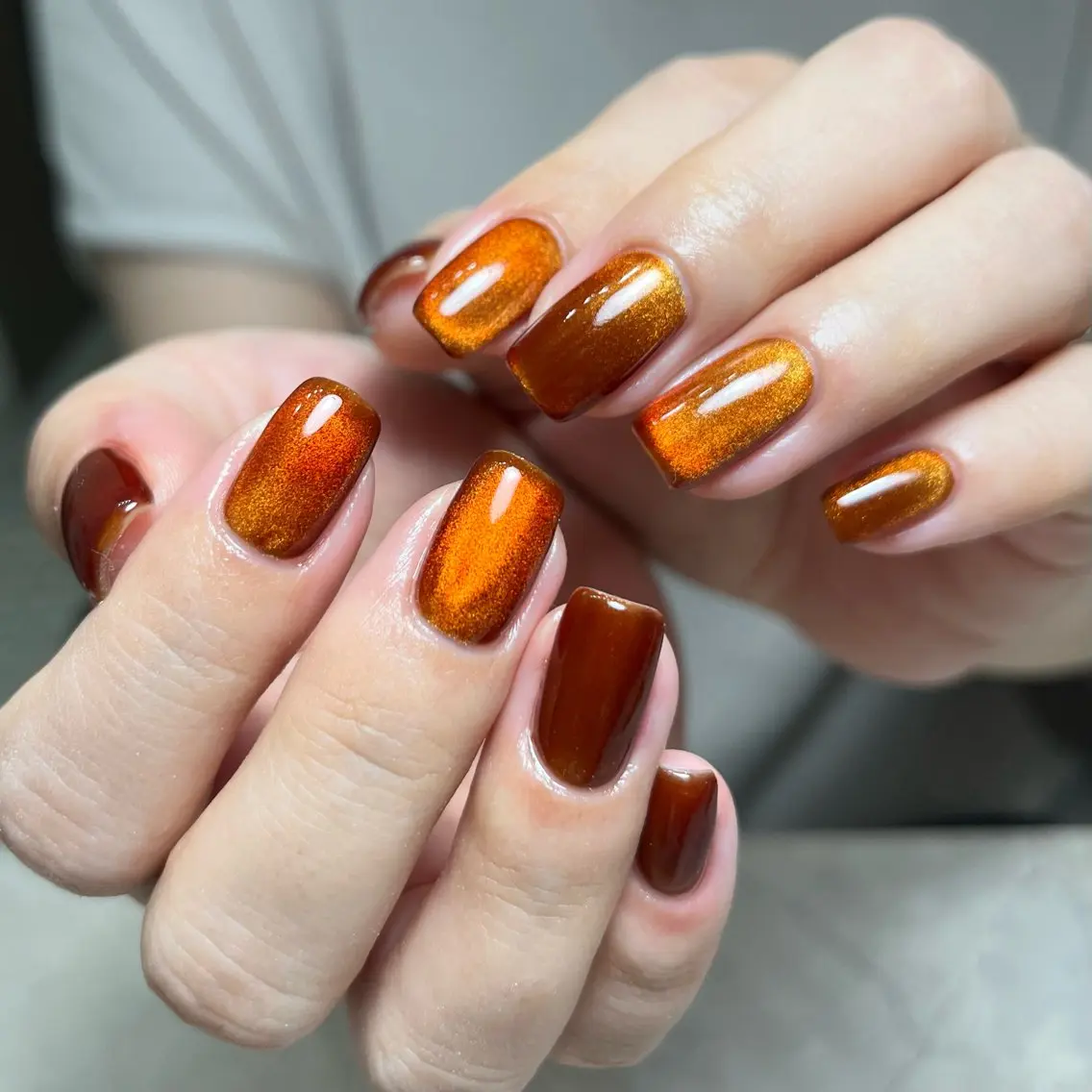 Burnt orange magnetic cat eye nail polish