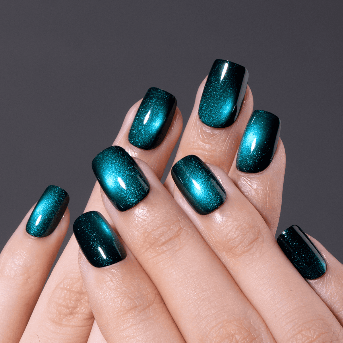 Deep teal magnetic cat eye nails jewel toned