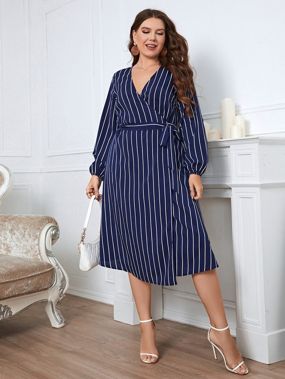 Plus size woman in a belted A-line fall dress