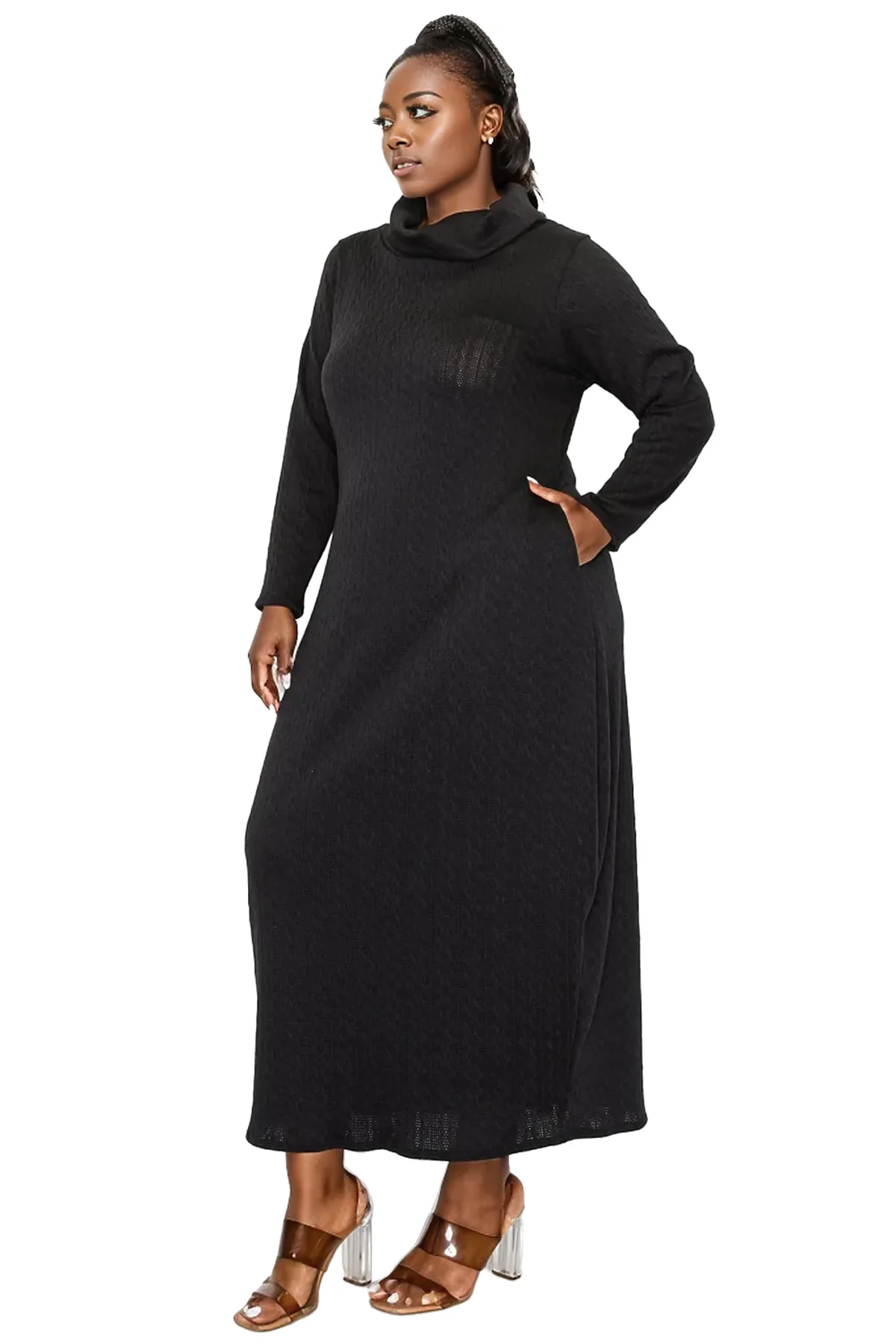 Plus size woman in a turtleneck maxi sweater dress