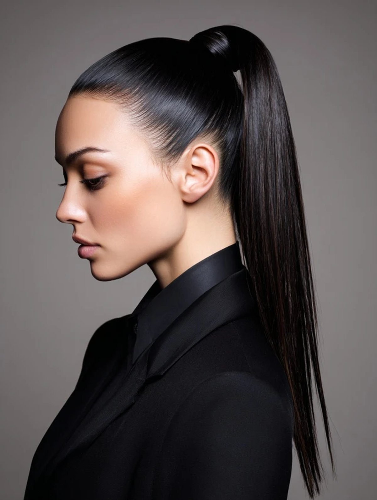 Sleek high ponytail hairstyle on a professional woman