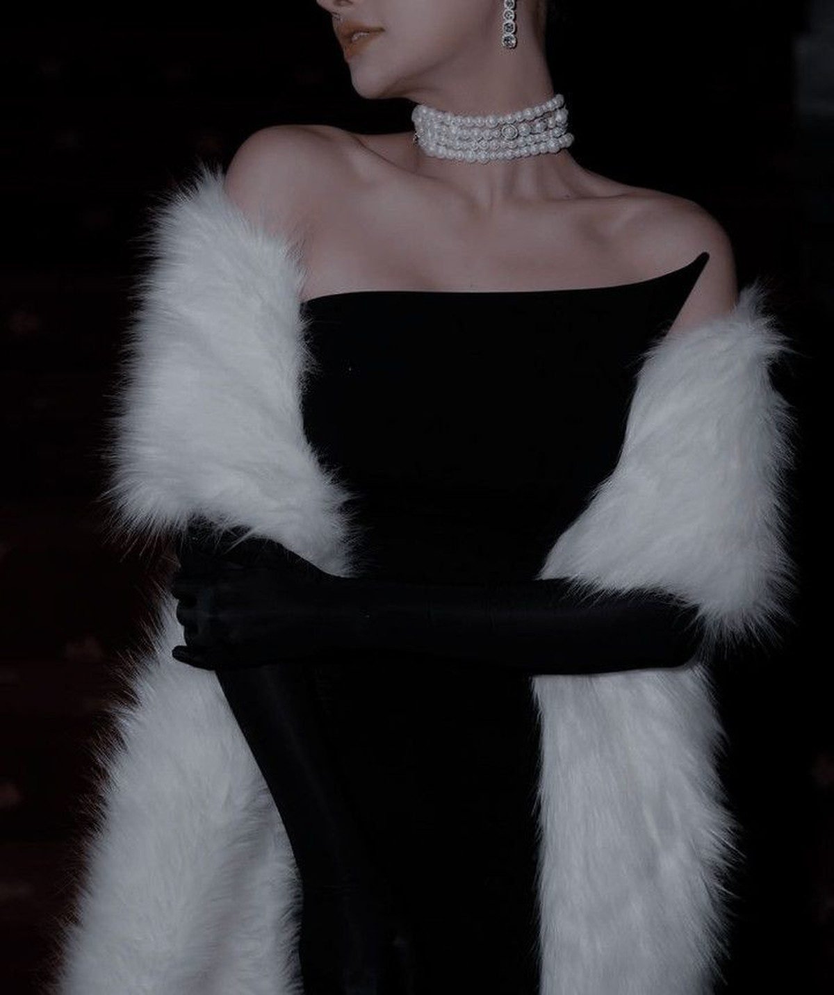 Vampire-inspired Halloween night outfit with black dress and dramatic red lips