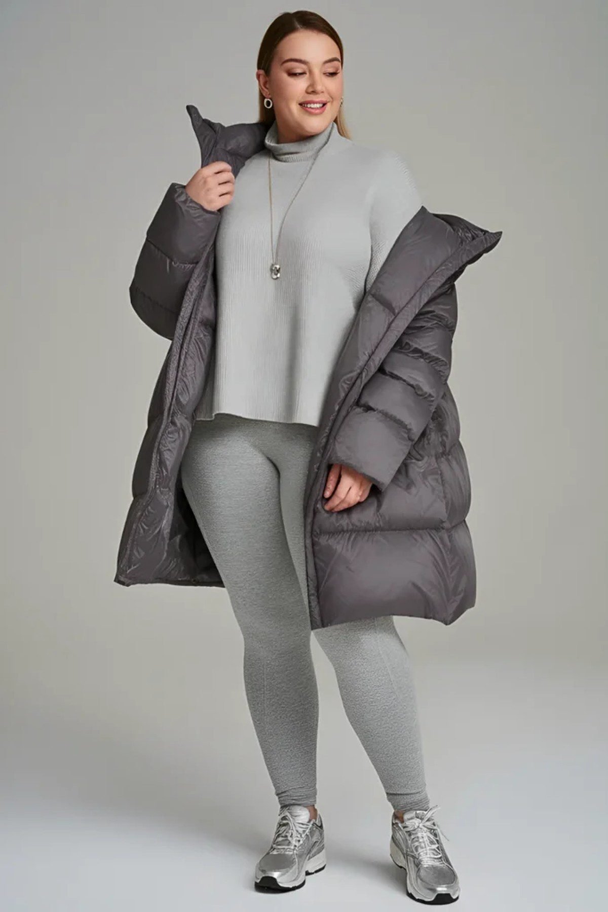 Plus size long cardigan with graphic tee leggings and sneakers for fall