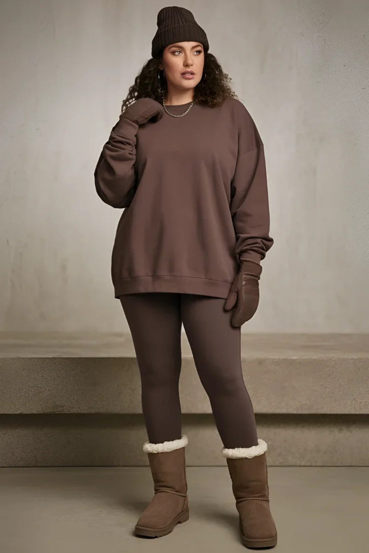 Plus size turtleneck bodysuit with leggings and knee-high boots for sleek fall style