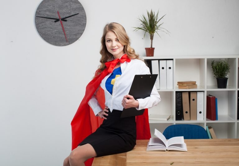 Woman in a business superhero Halloween costume