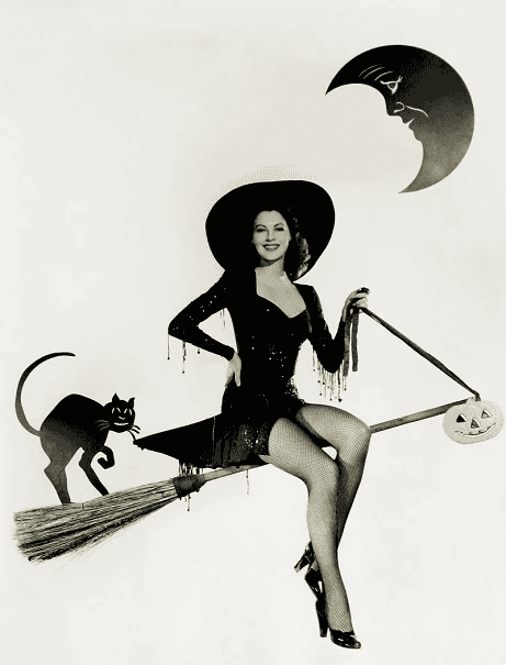 Woman in a 1920s vintage witch Halloween costume
